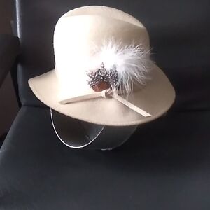 Chic Tan Hat with Feather Detail